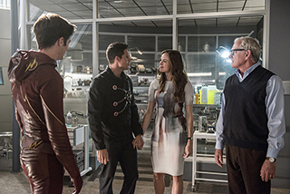 The Flash -- "The Man Who Saved Central City" -- Image FLA201b_0084b -- Pictured (L-R): Grant Gustin as Barry Allen/ The Flash, Robbie Amell as Ronnie, Danielle Panabaker as Caitlin Snow and Victor Garber as Professor Stein -- Photo: Cate Cameron /The CW -- ÃÂ© 2015 The CW Network, LLC. All rights reserved