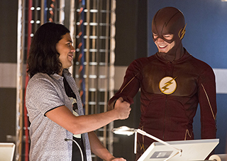The Flash -- "Family of Rogues" -- Image FLA203a_0017b.jpg -- Pictured (L-R): Carlos Valdes as Cisco Ramon and Grant Gustin as The Flash -- Photo: Jeff Weddell/The CW -- ÃÂ© 2015 The CW Network, LLC. All rights reserved.