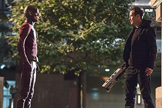 The Flash -- "The Fury of Firestorm" -- FLA204B_0127b -- Pictured (L-R): Grant Gustin as The Flash and Tom Cavanagh as Harrison Wells -- Photo: Cate Cameron /The CW -- ÃÂ© 2015 The CW Network, LLC. All rights reserved.