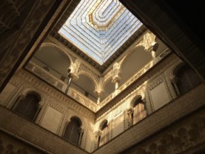 arches-are-a-huge-theme-throughout-the-several-floors-of-the-former-royal-residence-this-room-is-called-the-patio-of-the-dolls-because-youre-supposed-to-be-able-to-spot-the-doll-heads-engraved-in-